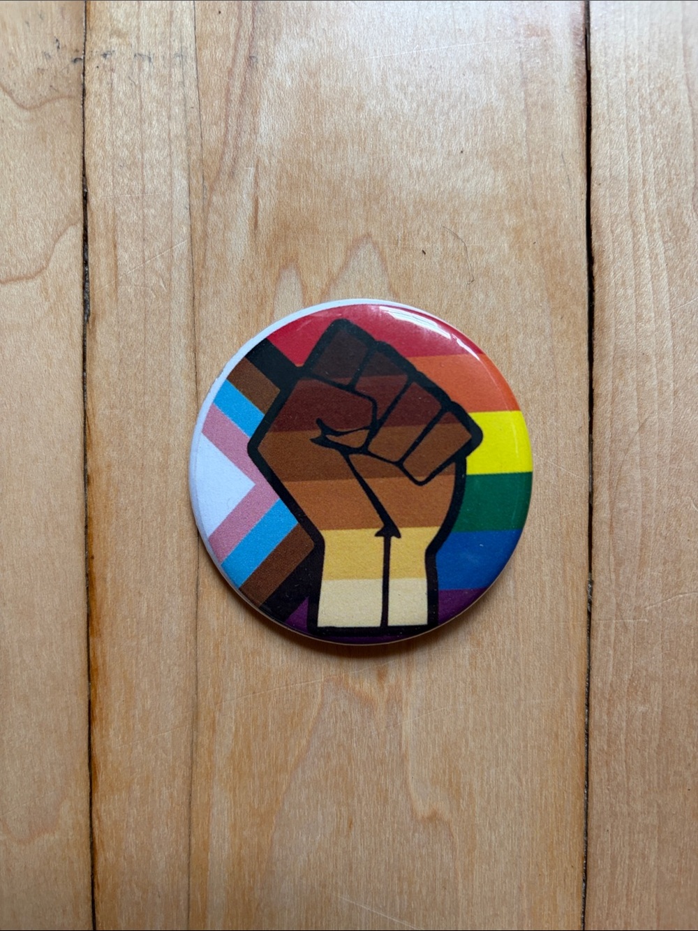 Progress Pride Fist Button Pin - Multicolor